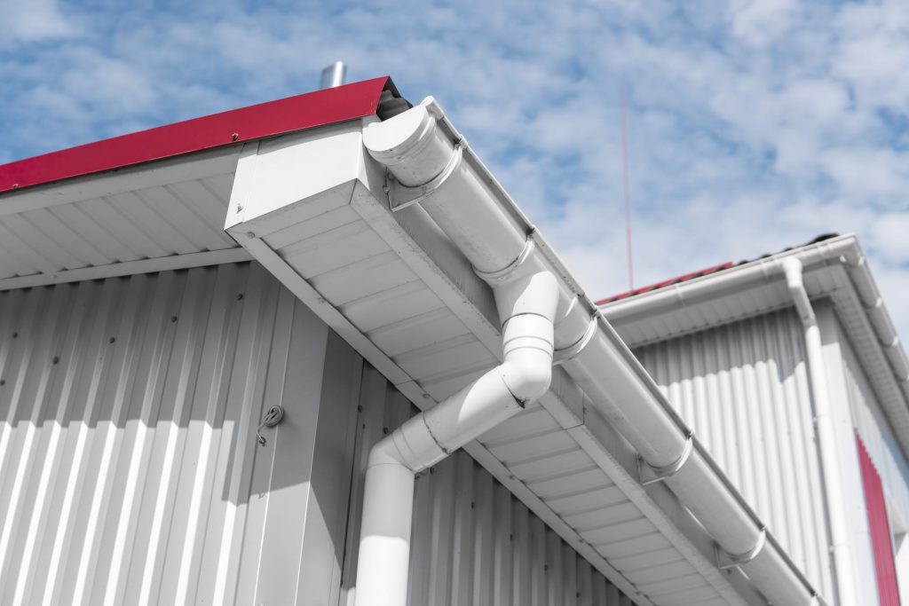 guttering repair and replacement close up blue sky
