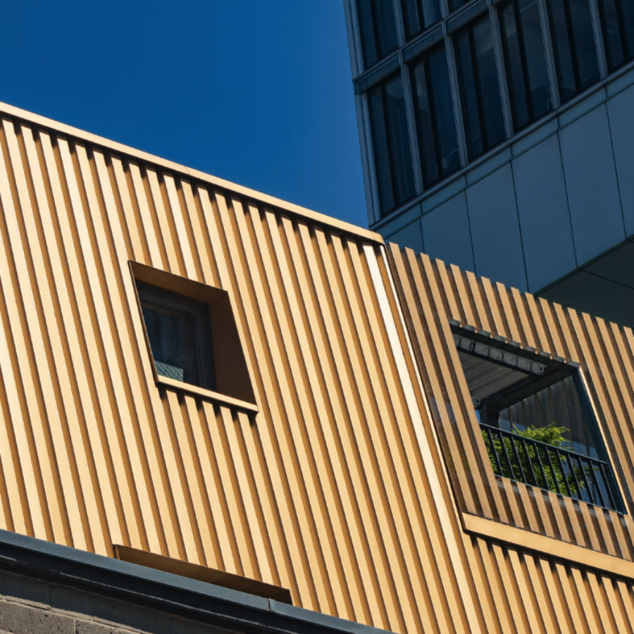 Metal wall cladding around building windows