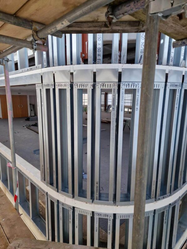 Curved steel framing installed for a new facade