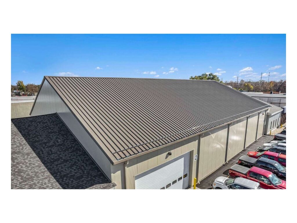 FALK RRP 40 ribbed insulated metal roof panels installed on a low commercial building