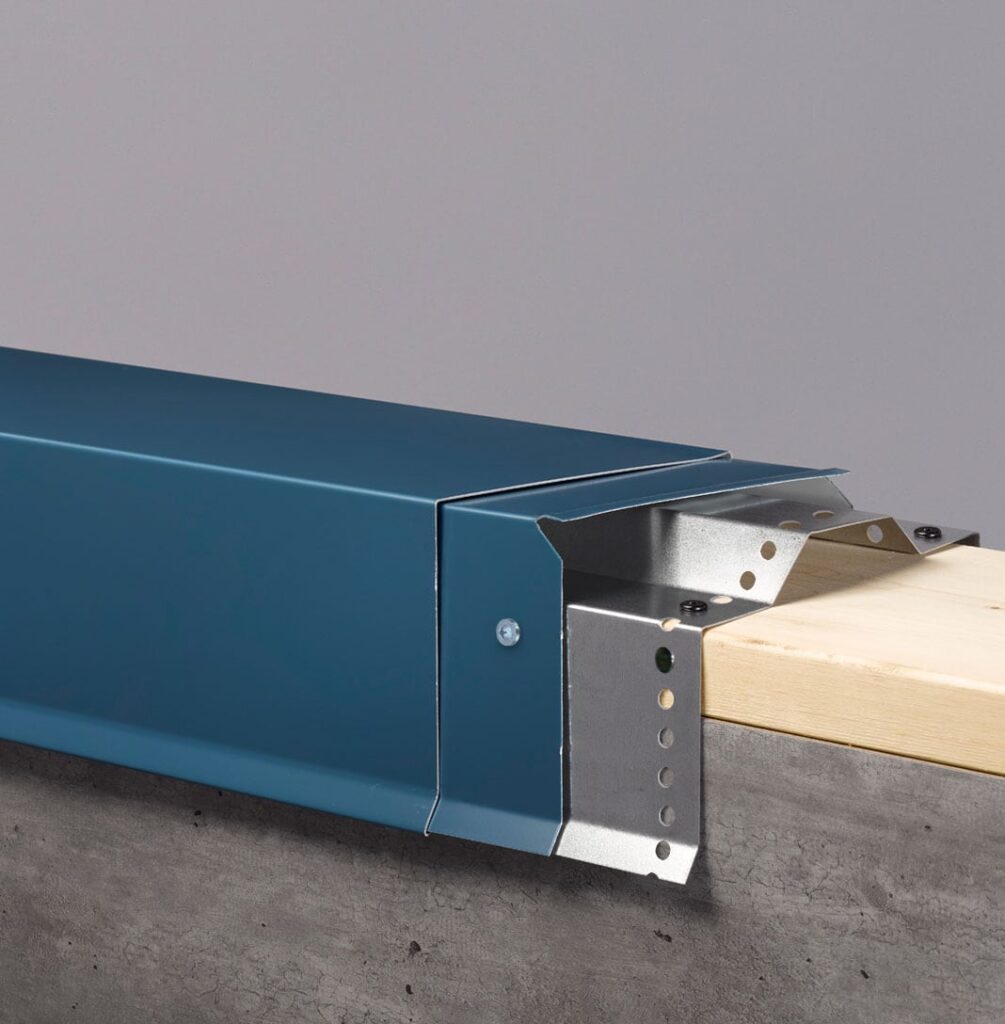 Cutaway rendering of a blue Hickman PermaSnap Coping on a parapet wall