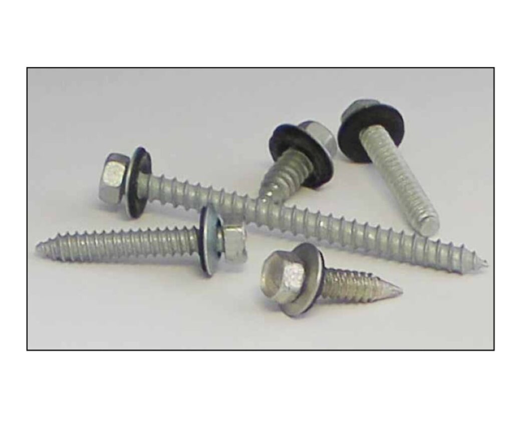 Carbon steel self-tapping hex washer screws with sealing washers in several lengths on a gray surface